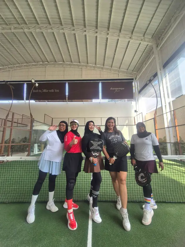 Players posing on court