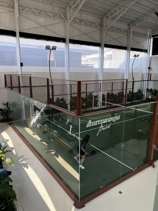 Court seen from above with the Dharmawangsa Privé mark on the glass