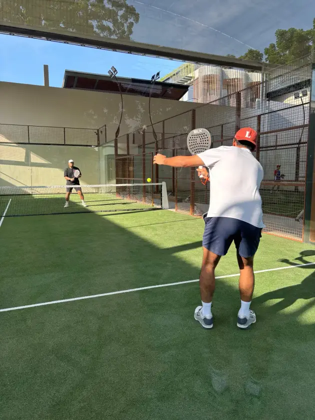 Player hitting a forehand on court